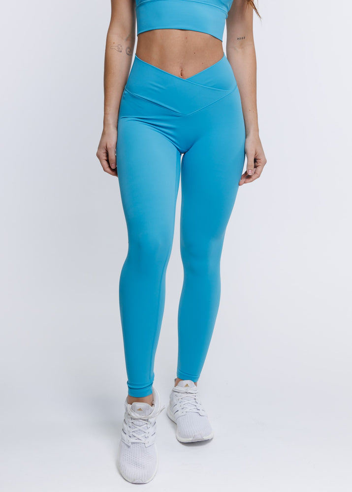 
                  
                    Load image into Gallery viewer, Elevate Cross Leggings - Turquoise
                  
                