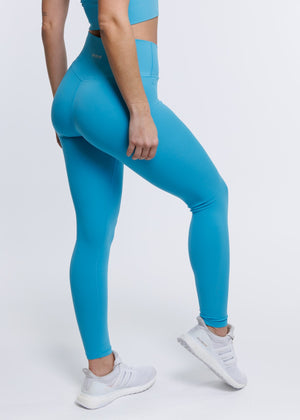 
                  
                    Load image into Gallery viewer, Elevate Cross Leggings - Turquoise
                  
                